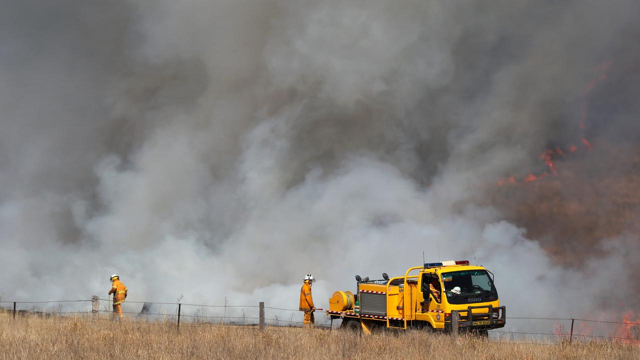 Firefighters brace for the worst as fires continue to burn in the Canungra and Sarabah regions. Picture: NIGEL HALLETT