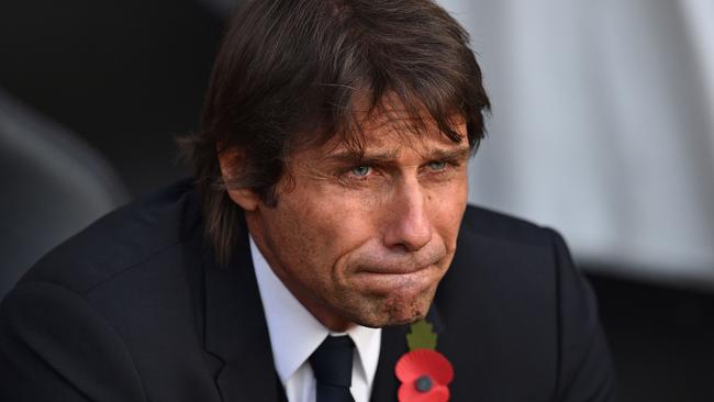 Chelsea's Italian head coach Antonio Conte takes his seat.