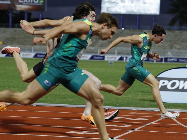 Joshua Azzopardi (left) storms down the outside to beat home Sebastian Sultana (right) and Rohan Browning. Picture: Michael Klein