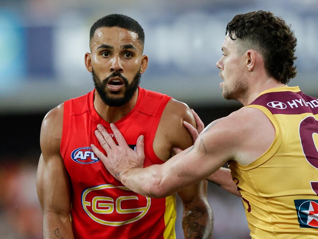 GOLD COAST, AUSTRALIA - JULY 29: Touk Miller of the Suns and Lachie Neale of the Lions in action during the 2023 AFL Round 20 match between the Gold Coast SUNS and the Brisbane Lions at Heritage Bank Stadium on July 29, 2023 in Queensland, Australia. (Photo by Russell Freeman/AFL Photos via Getty Images)