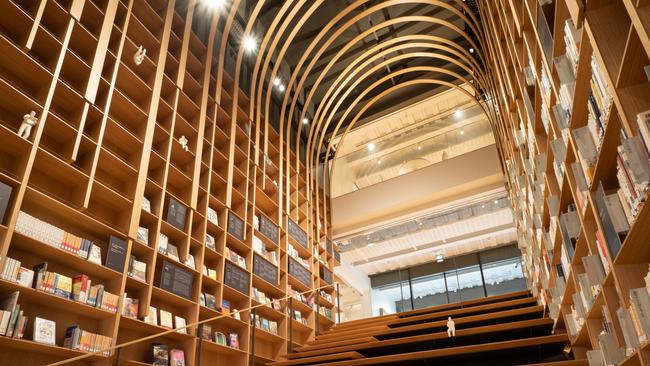 The dramatic staircase bookshelves at the Haruki Murakami Library in Tokyo.