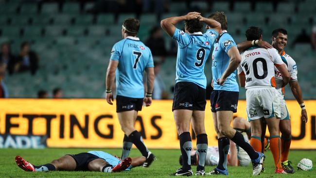 Waratahs players react to their 2011 loss to the Cheetahs.