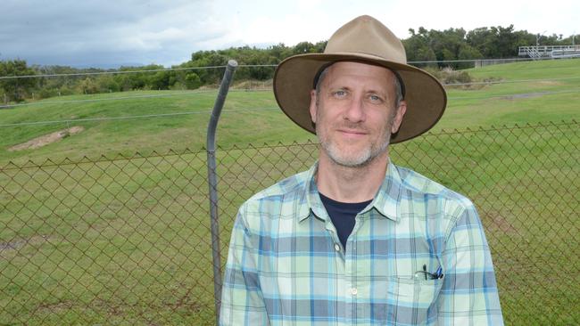 Senior Project Manager John Hart near Byron Shire Council's wastewater treatment plant at the Byron Wetlands. Behind him is the site where the council hopes to build a major bioenergy facility.