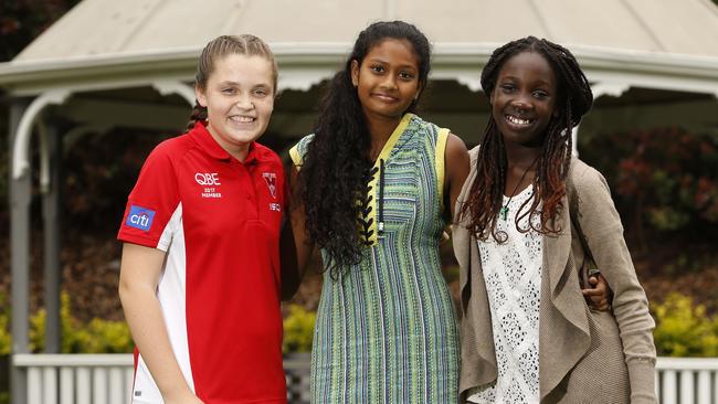 Kirilee Stanmore 13, Martha Macnab, 15, and Mary Wol, 12, at the Baulkham Hills Hawks season launch. Pictures: David Swift