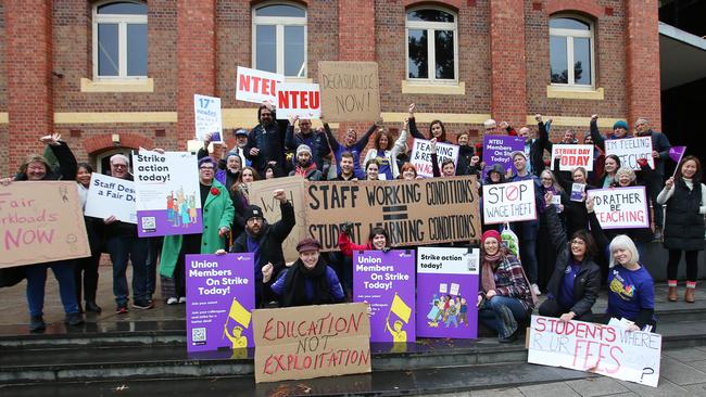 Deakin’s staff and union have slammed its proposal to cut RDOs for student service workers. Union members pictured at a strike in July. Picture: Alan Barber