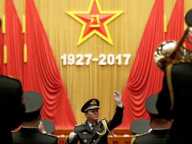 A military band commemorates the 90th anniversary of the founding of the People's Liberation Army at the Great Hall of the People in Beijing. China's President Xi Jinping has issued a tough line on national sovereignty amid multiple disputes with his country’s neighbours. Picture: AP