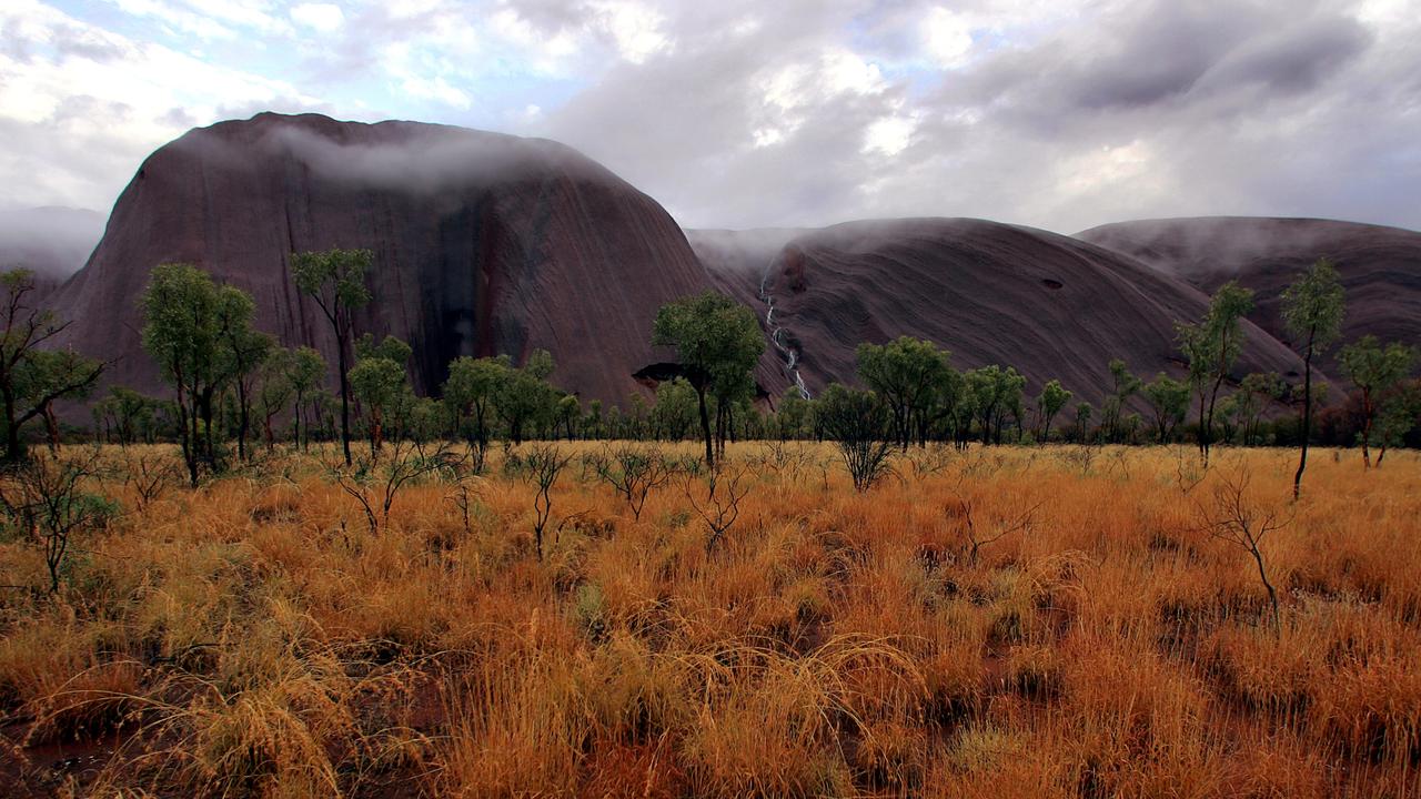 <b>Psalm 65: Thou sendest rain into the little valleys thereof, Thou makest it soft with the drops of rain and blessest the increase of it.</b> <br/>Sunrise at Uluru, Northern Territory after a rare two days of solid rain. Photo by James Croucher