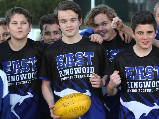 The East Ringwood Roos have been learning sign language to support teammate Max Beasley, centre, who is one of only two deaf junior footballers in the Eastern Football League. Picture: STUART MILLIGAN