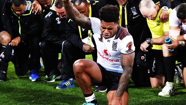 Kevin Naiqama leads Fiji’s prayer after their win over New Zealand.