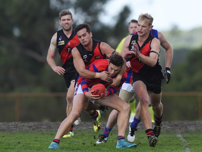 Sam Fox tackles Rye’s Harry Whitty. Picture: Chris Eastman