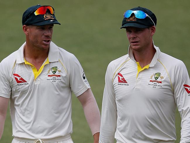 David Warner (left) and Steve Smith are only allowed to play grade cricket under the terms of their 12 month bans. Picture: AFP