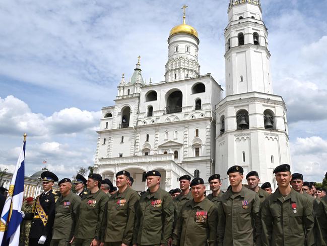 Servicemen gather on the Sobornaya (Cathedral) Square before President Vladimir Putin's address to troops. Picture: AFP