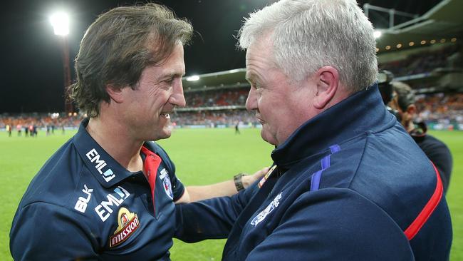 Luke Beveridge and president Peter Gordon rejoice after the preliminary final. Picture: Michael Klein