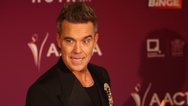 Robbie Williams  on the red carpet at the Australian Academy of Cinema and Television Arts (AACTA) awards at the Home of the Arts on the Gold Coast, Friday, February 7, 2025. Picture: Annette Dew.