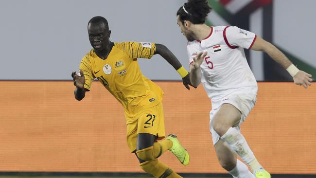 Awer Mabil in action in an AFC Asian Cup group B match against Syria in the United Arab Emirates last week. AP Photo/Kamran Jebreili