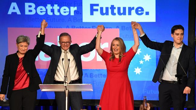 Anthony Albanese with Penny Wong and his partner Jodie Haydon and son Nathan celebrate Labor’s victory at Canterbury Hurlstone Park RSL on May 21, 2022. Picture: Getty