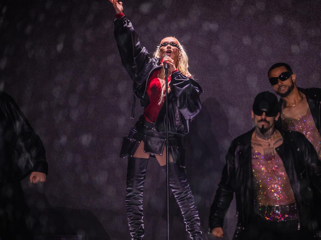 Christina Aguilera plays at an outdoor stage at Flemington a Racecourse in the rain. Picture: Jason Edwards