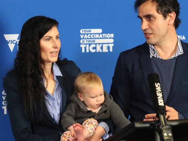 MELBOURNE, AUSTRALIA - NewsWire Photos, OCTOBER 12, 2021. Charlotte Jagga a emergency physician and husband Marcelle Jagga an anaesthetist  and their baby Revel, speak at a press conference on the latest COVID situation in Victoria. Picture: NCA NewsWire / David Crosling