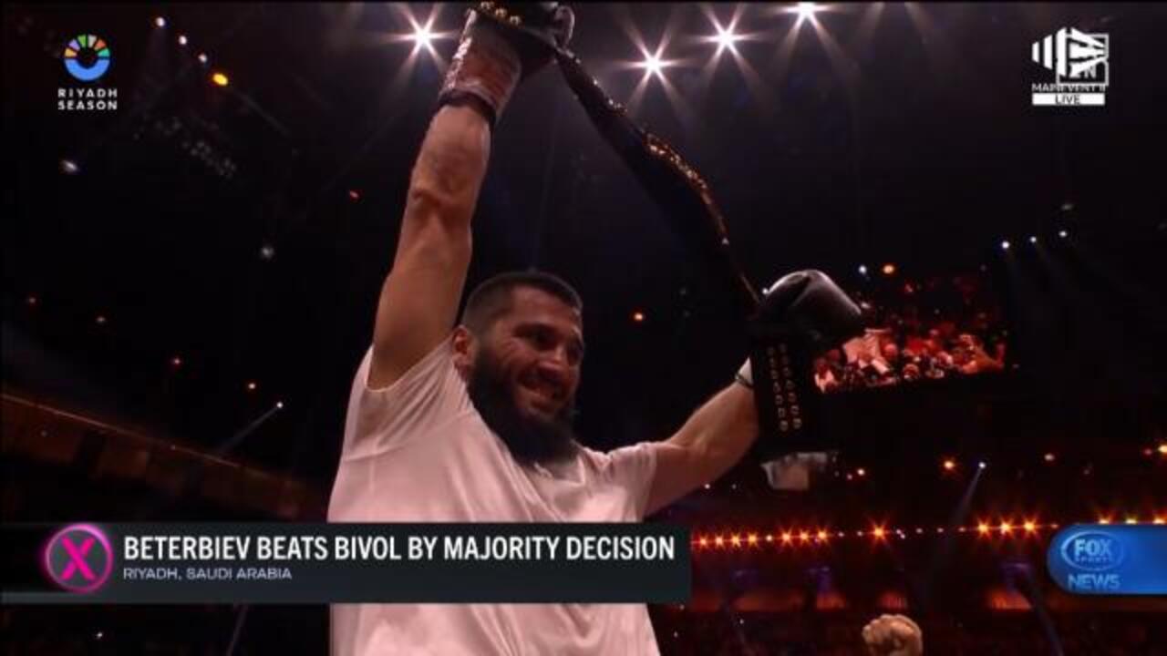 Beterbiev slugs it out to beat Bivol