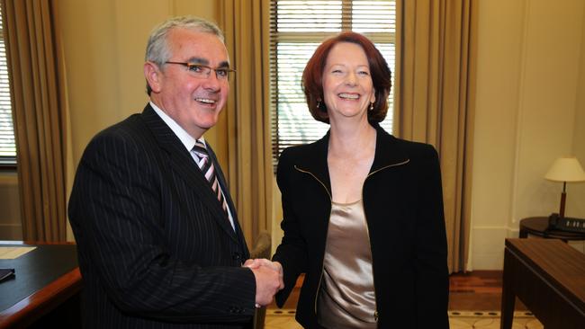 Mr Wilkie with Julia Gillard in 2010. Picture: AAP