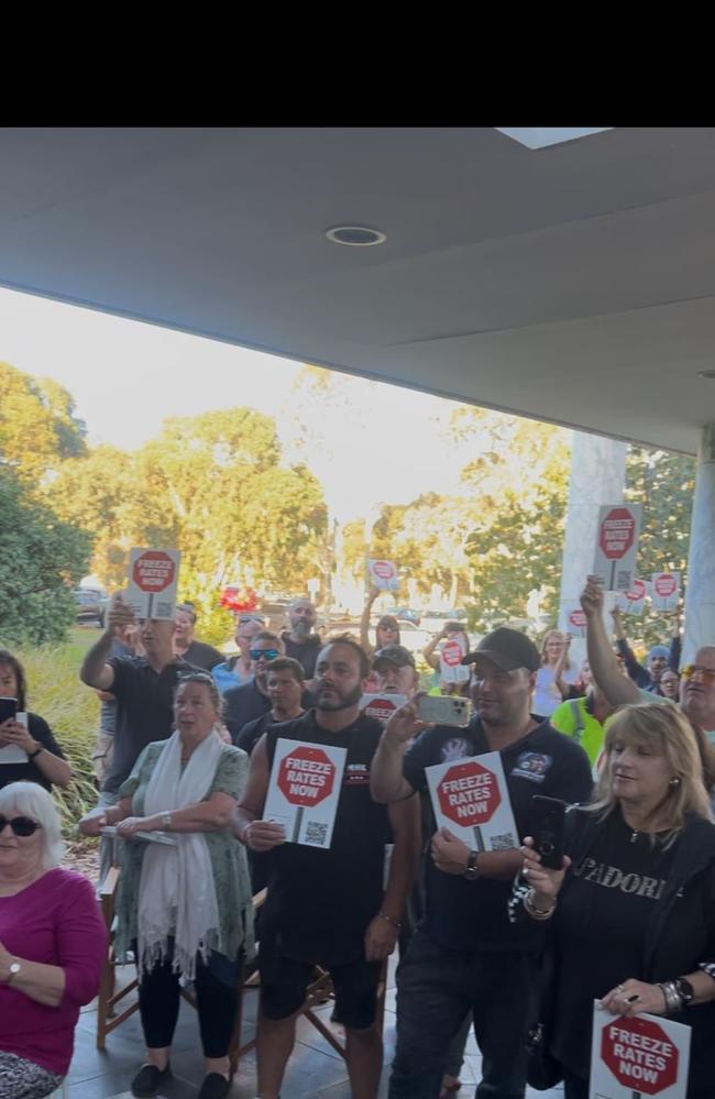 About 50 people gathered in support of the mayor Aidan McLindon outside Whittlesea’s council chambers. Picture: Himangi Singh.