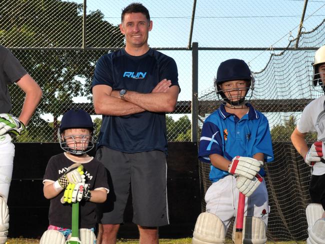 Former Waratah junior Nick Wheeler (right) with former Test cricketer Mike Hussey in 2014. Picture: File.