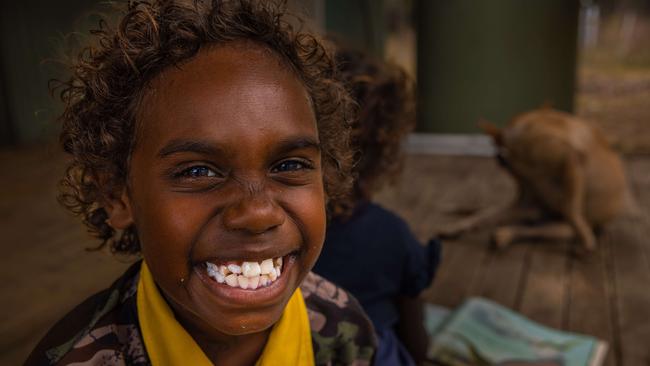 ONE TIME USE: Anastias Pascoe, 7, on the deck of the Gamardi Homeland Learning Centre - Photo by Rebecca Parker only for use with this package