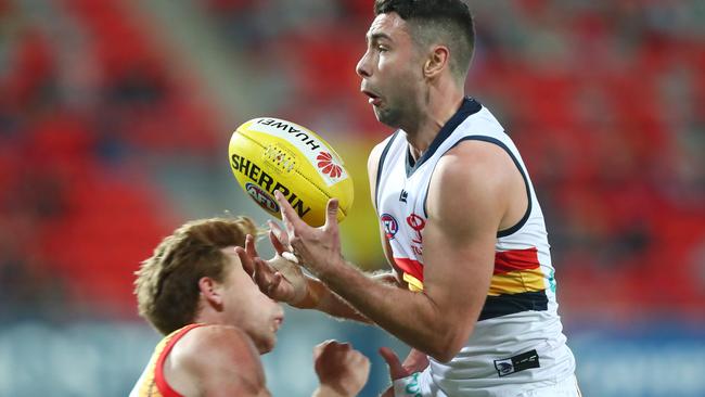 Rory Atkins of the Crows takes a mark during the big win over the Suns at Metricon Stadium. Picture: Chris Hyde/Getty Images