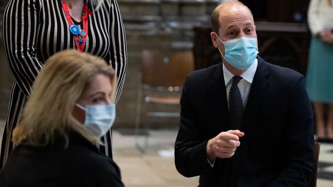 Prince William, Duke of Cambridge, meet volunteer Paola Totaro at Westminster Abbey. Picture: Getty