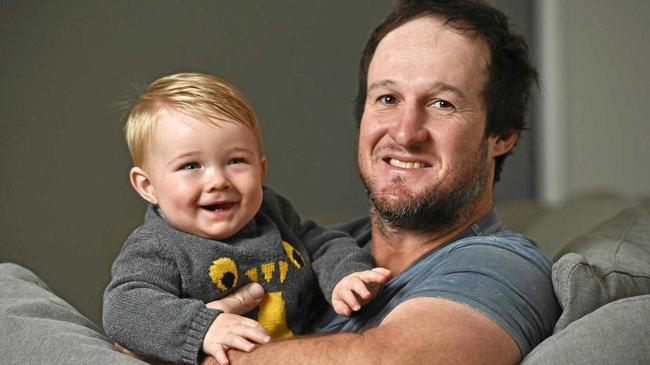 IN GOOD HANDS: Ripley plumber Clint Scott, with son Leo, will celebrate his first Father's Day tomorrow. Picture: Cordell Richardson