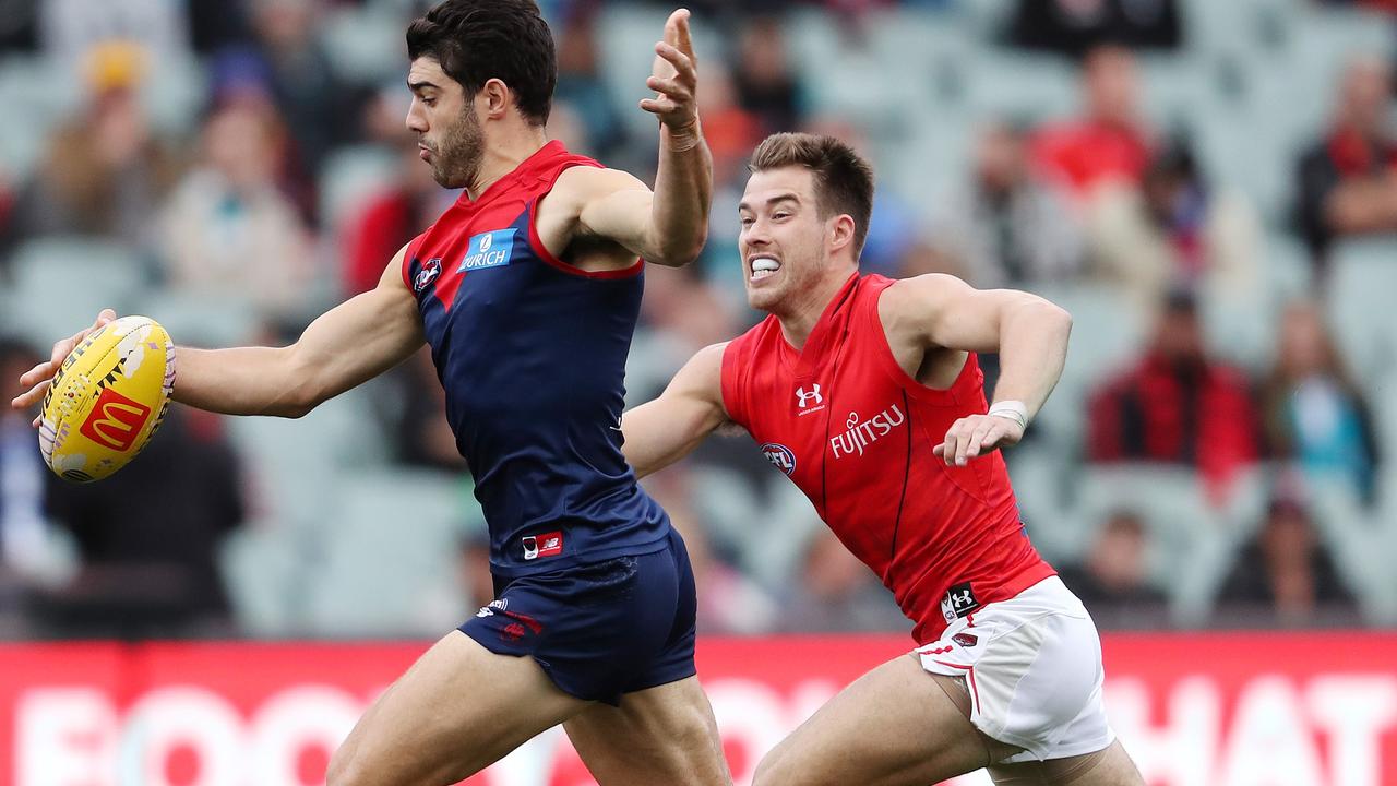 Essendon captain Zach Merrett and Collingwood midfielder Taylor Adams will both miss out on the Anzac Day match due to one-week suspensions for rough conduct. Picture: Sarah Reed / Getty Images