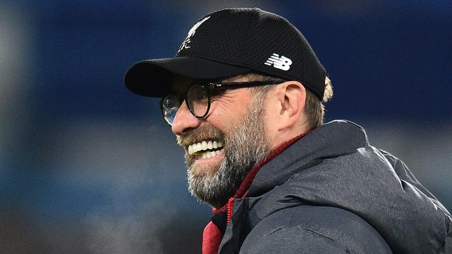 The most famous set of teeth at Liverpool since Luiz Suarez. (Photo by Glyn KIRK / AFP)