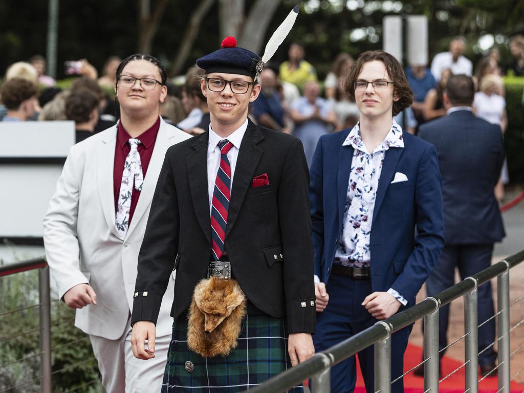 At Centenary Heights State High School formal are (from left) TJ Rademeyer, Liam Scurr and Zackary Rassmussen at Picnic Point, Friday, November 15, 2024. Picture: Kevin Farmer