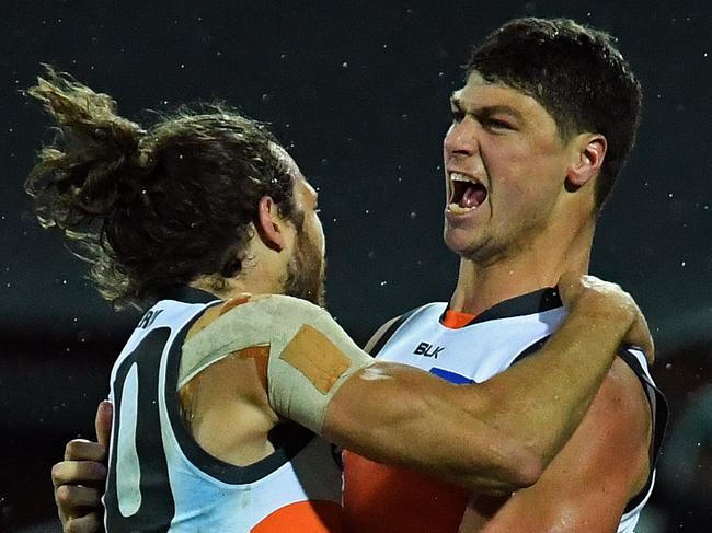 24/07/16 - AFL- Port Adelaide v GWS at Adelaide Oval. Greater Western SydneyÕs Jonathon Patton celebrates with team-mate Adam Kennedy after kicking a goal. Photo Tom Huntley