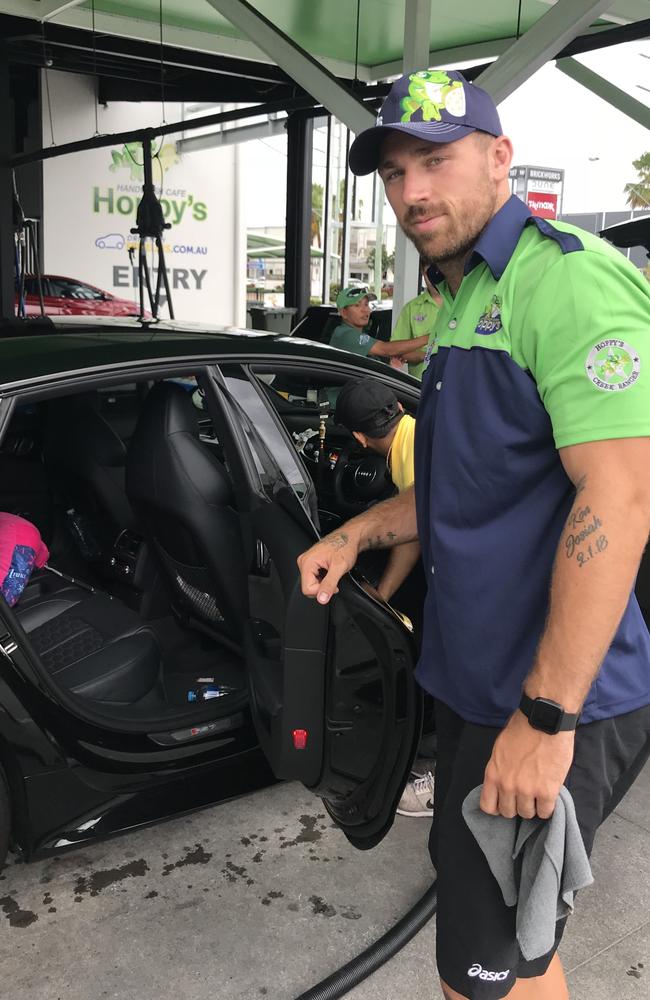 Bryce Cartwright washing cars on the Gold Coast.