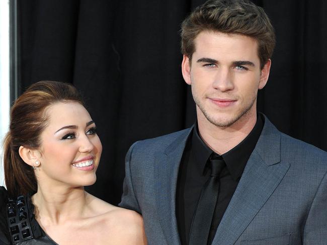 Cyrus and Hemsworth arrive for the premiere of The Last Song in Hollywood in 2010. Picture: AFP