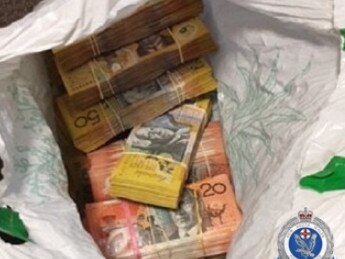 Some of the cash allegedly found in the Beaconsfield St home. Picture: NSW Police Picture: NSW Police