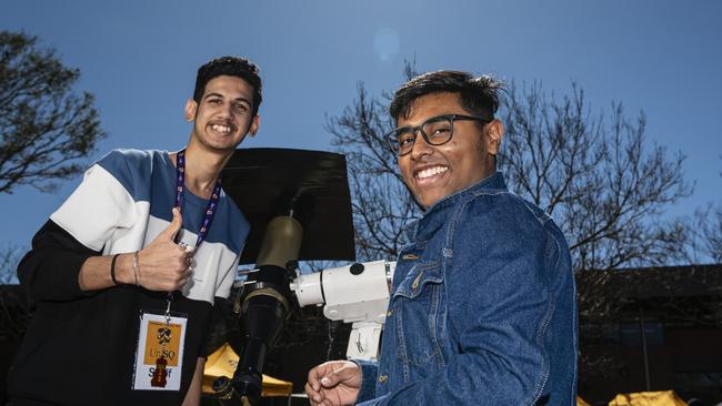 Anshul Vasishth (left) and Adhith Sivaharen after looking at the sun through a telescope at the iLAuNCH Space family fun day, part of UniSQ's Open Day. Picture: Kevin Farmer