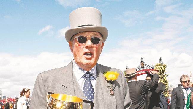 Owner Lloyd Williams celebrates with the cup. Photo by Paul Rovere/Getty Images.