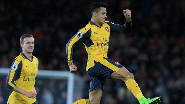 Arsenal's Chilean striker Alexis Sanchez celebrates.