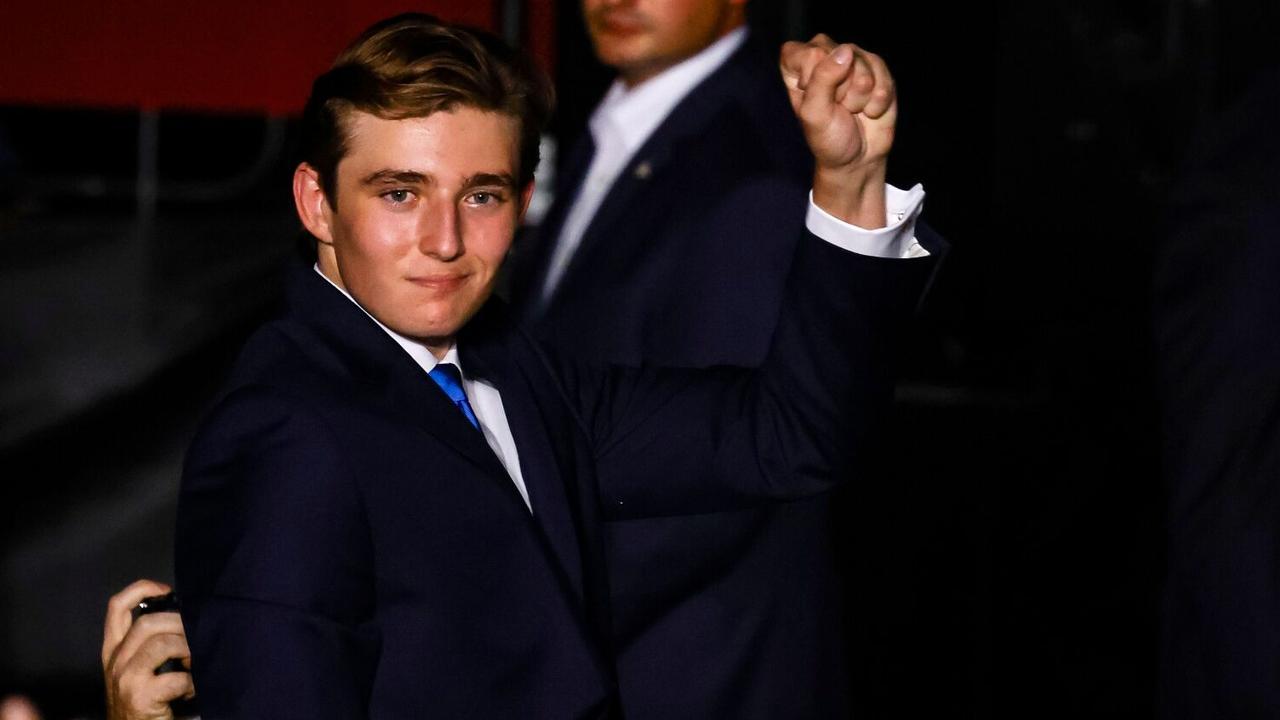 Barron Trump pumps his fist to the crowd. Picture: Eva Marie Uzcategui/Bloomberg via Getty Images