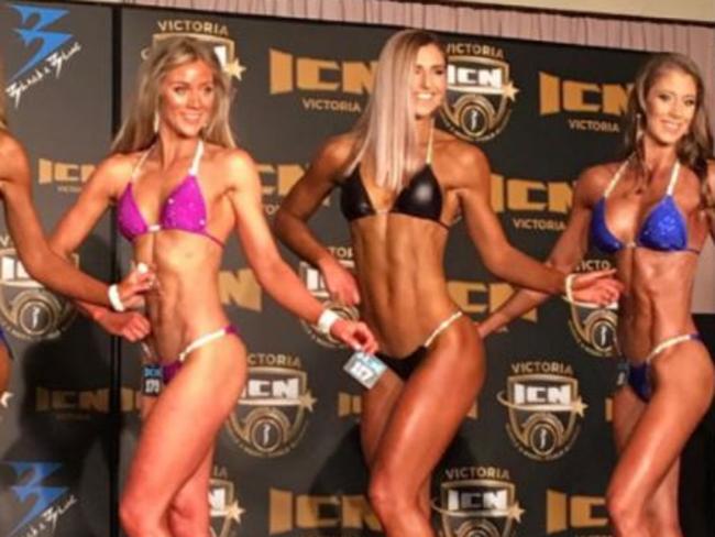 Frances Abbott (centre) made her bodybuilding debut in Melbourne on Saturday. Picture: notanotherfitnessblogger