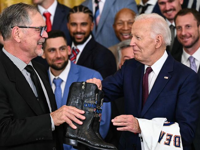 Mr Biden was given a pair of cowboy boots during the event. Picture: AFP