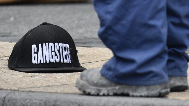 A hat with Gangster written on it is seen at the Commonwealth Bank Springvale. Picture Julian Smith/AAP