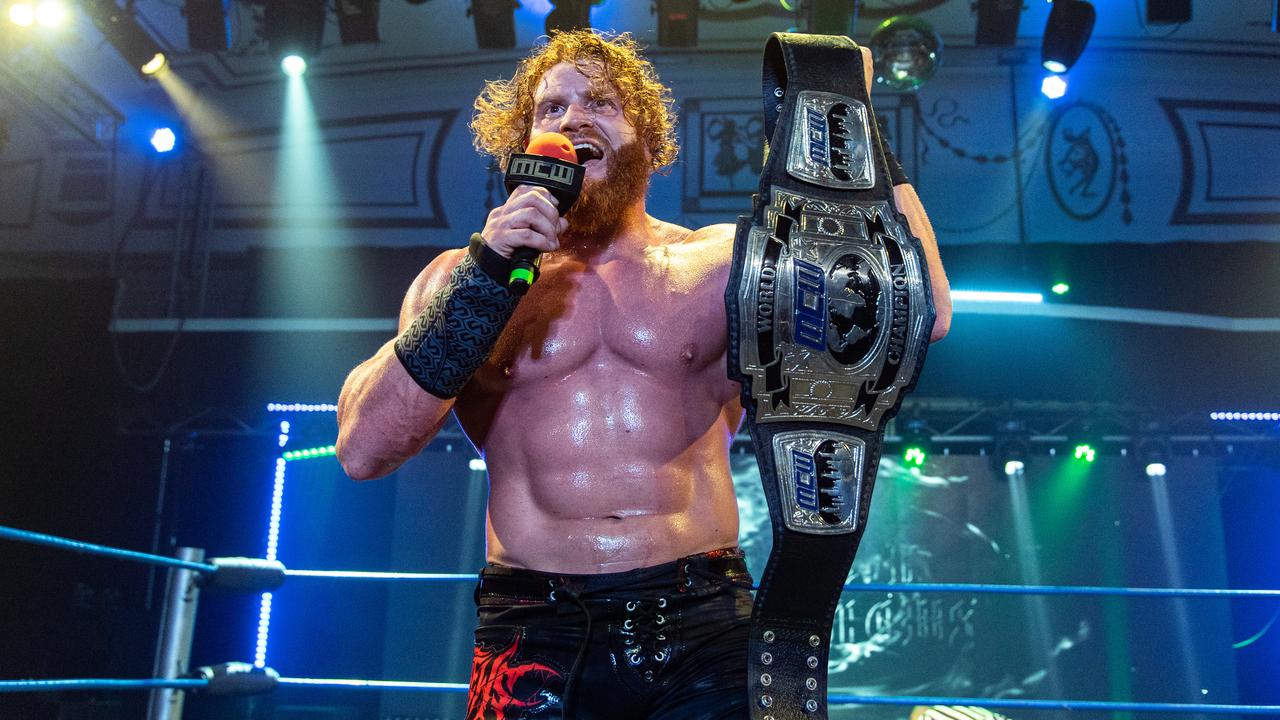 Buddy Murphy with the Melbourne City Wrestling world heavyweight championship. Pic supplied via MCW