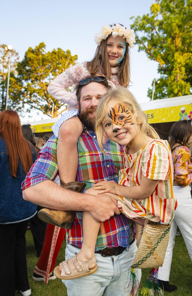 Kim McGregor with his daughters Eleanor (top) and Neave McGregor at the Toowoomba Carnival of Flowers Festival of Food and Wine, Saturday, September 14, 2024. Picture: Kevin Farmer