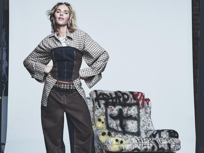 EMBARGO FOR WISH MAGAZINE, 02 MAY 2025. FEE MAY APPLY. Pip Edwards says her return to Ksubi is like pulling on a favourite pair of jeans. Edwards wears Ksubi bustier, shirt, Tshirt and jeans, Miu Miu belt, her own Jimmy Choo shoes, Tiffany & Co. white gold and diamond Tiffany HardWear earrings and necklace. Styling by Kaila Matthews. Photo: Jake Terrey