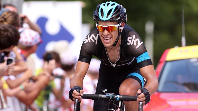 Australia's Richie Porte crosses the Tour de France Stage 8 finish line second.