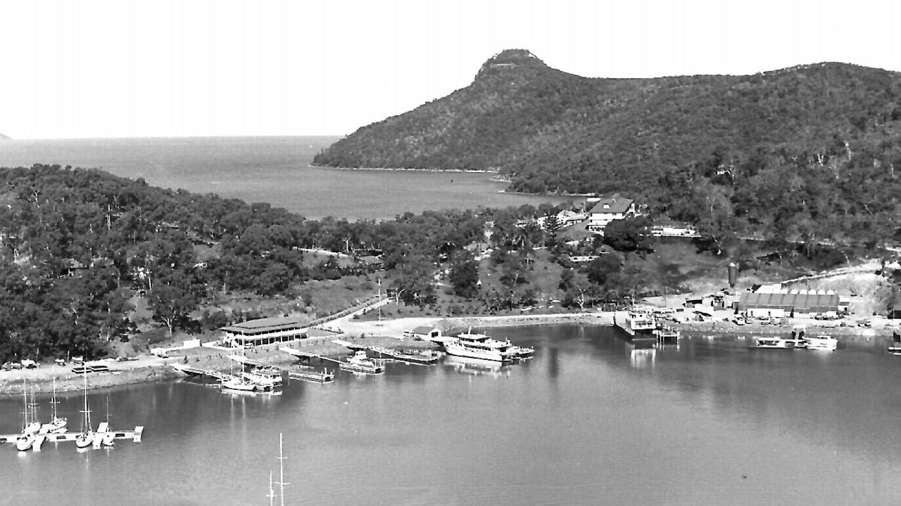 1983 aerial photo of Hamilton Island, Whitsundays, showing Mariners Inn and first Marina berths. Queensland / Hotels Travel