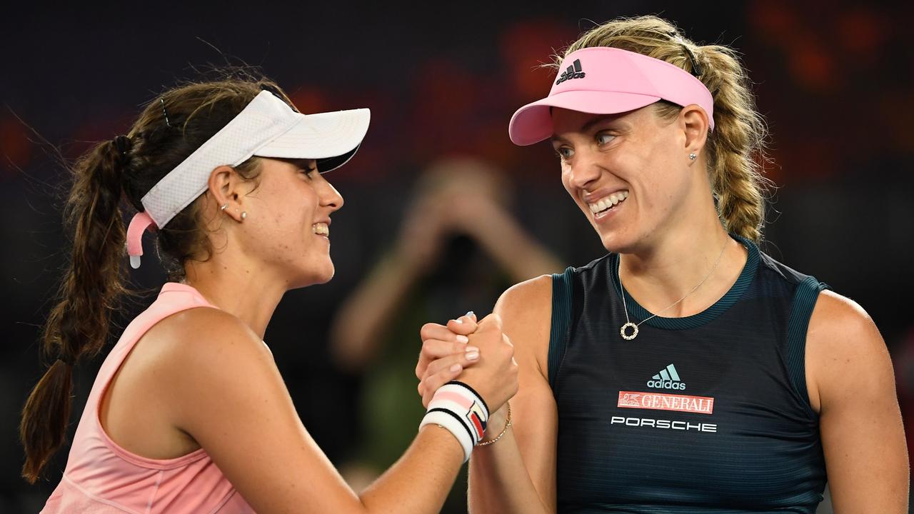 Kim Birrell shakes hands with Germany's Angelique Kerber who won their Australian Open third round women's singles at the 2019 event. Picture: William West, AFP